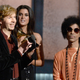 Beck (L) accepts the Album of the Year award for “Morning Phase” from musician Prince onstage during The 57th Annual GRAMMY Awards on Feb. 8, 2015, in Los Angeles.